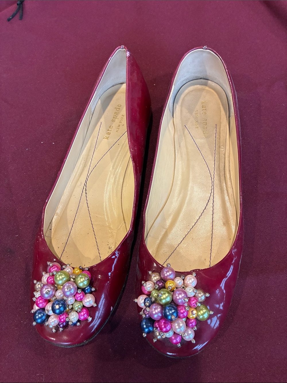 kate spade Burgundy Patent Leather Flats with Multicolor Pearl Cluster